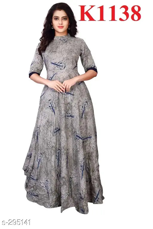The image features a woman in a sleeveless, knee-length kurta with a flared bottom, which suggests a traditional yet contemporary style. The kurta is adorned with intricate designs and patterns on the bodice, while the lower half showcases a solid color. The woman is posing against a plain background, allowing the kurta to be the focal point of the image