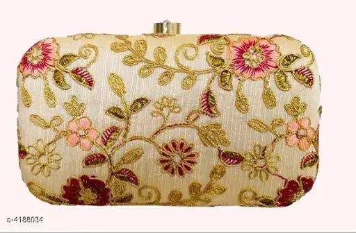 Floral pattern embroidered on a light background, gold embellishments, fabric clutch