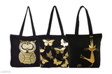 Black canvas slingbags with floral and owl prints, three pieces in a set