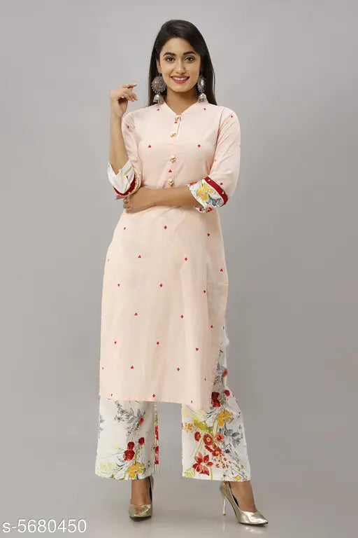 Women's cotton A-line embroidered long kurti with palazzos, printed, three-quarter sleeves, round neckline. Indian ethnic wear for casual and festive occasions