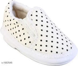 White adorable kids boot with star pattern and velcro closure
