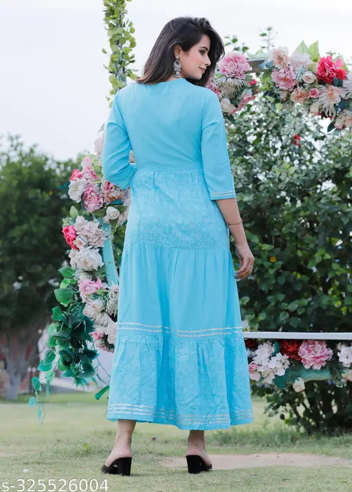 Festive, long-sleeve embroidered yoke dress in bright turquoise