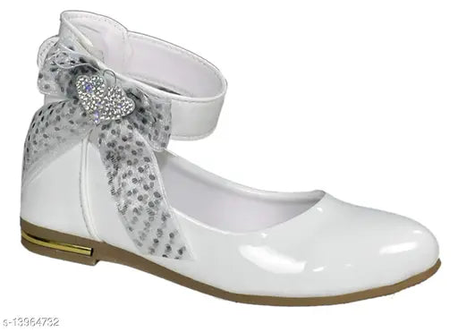 Synthetic leather white bellies, versatile footwear for girls aged 9 to 10 years, PU sole on display