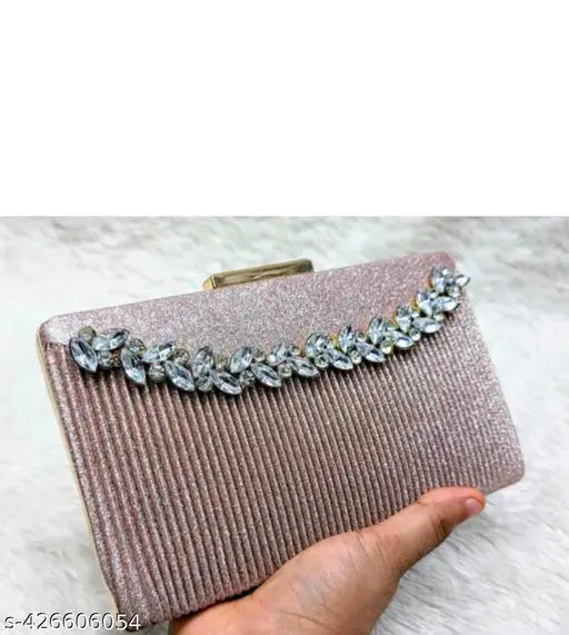 Elegant bridal clutch with intricate embroidery, crafted in beige satin