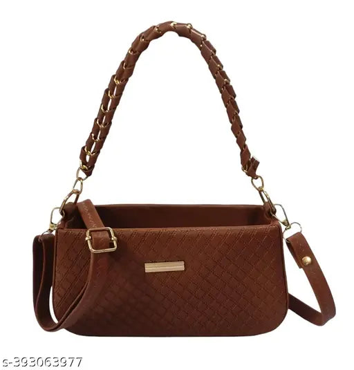 A brown quilted sling bag with a chain strap