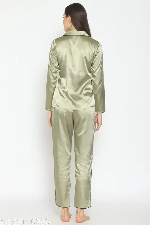 Solid green satin pyjama set for women, Pretty Loving Thing shirt and bottom with long sleeves on display