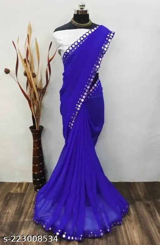 Blue saree with embroidered detailing on a mannequin