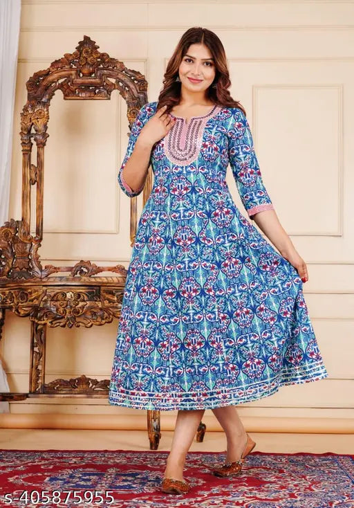 Trendy embroidered cotton anarkali kurta, calf-length with gota detailing, round neck and three-quarter sleeves. Indian ethnic wear in floral print. Perfect for regular wear." (103 characters)