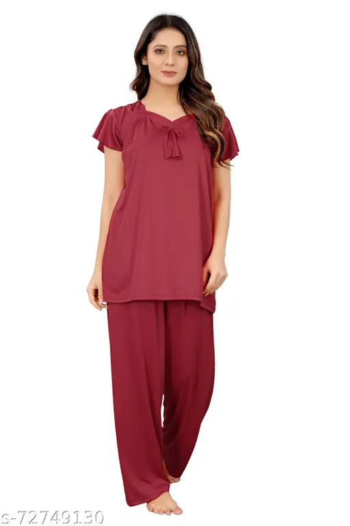 Attractive satin nightsuit for daily wear, solid color and easy washable. Includes 1 top and 1 pyjama in M, L, XL sizes (38/25/26, 40/26/27, 42/27/28). Made of satin lycra blend fabric, origin India