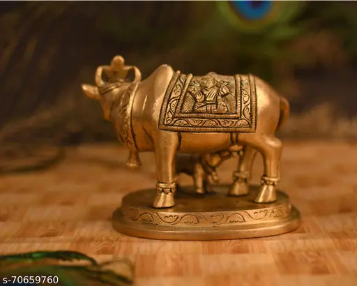 Handmade brass Kamdhenu Nandi cow sculpture with golden finish, 9 cm tall animal showpiece for spiritual decor
