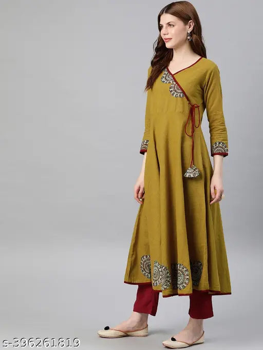 Yellow cotton women's long-sleeve kameez with a solid front and surplice back, matching palazzo pants