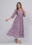 The image displays a woman wearing a long-sleeved, patterned kameez. It features a high neckline and is paired with a matching dupatta. The set includes a short kurta with a similar design
