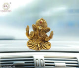 Metal Ganesha idol for car dashboard, handcrafted home decor item from India