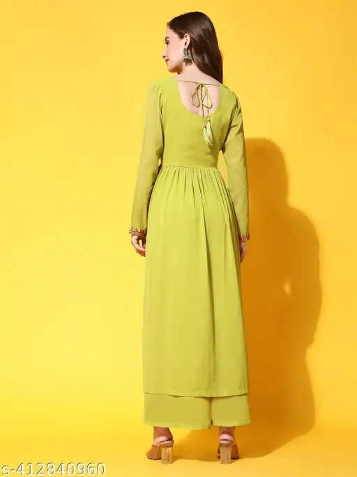 Georgette A-line kurta with round neck, full sleeves, and embroidered net in India. Sharara with ankle-length and elasticated waistband