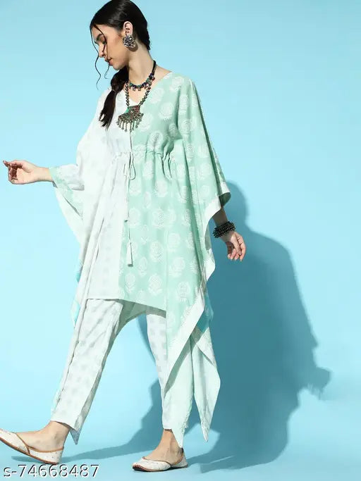 Cream rayon kaftan-style kurta and pant set with V-neck, printed net pattern, India origin