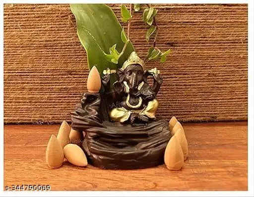 Gold resin Ganesh idol meditating smoke water fountain incense burner with 10 free cones, perfect for home decor and festive occasions