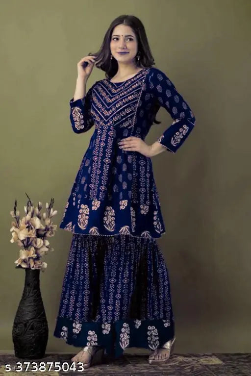 Womens blue kurta with matching pajamas, embellished border