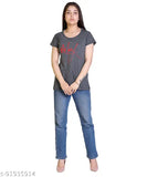 A woman in a printed, colorful t-shirt