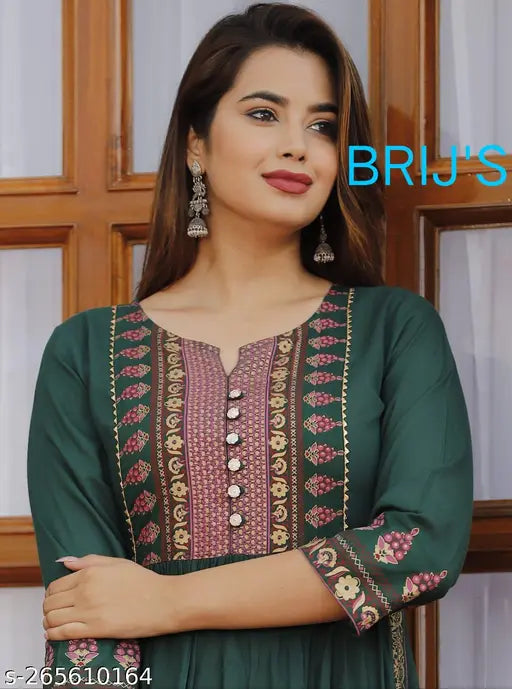 Green kameez with intricate gold border