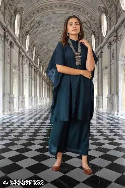 Georgette kurta set with palazzos, solid net pattern, short sleeves. Women's Indian traditional wear