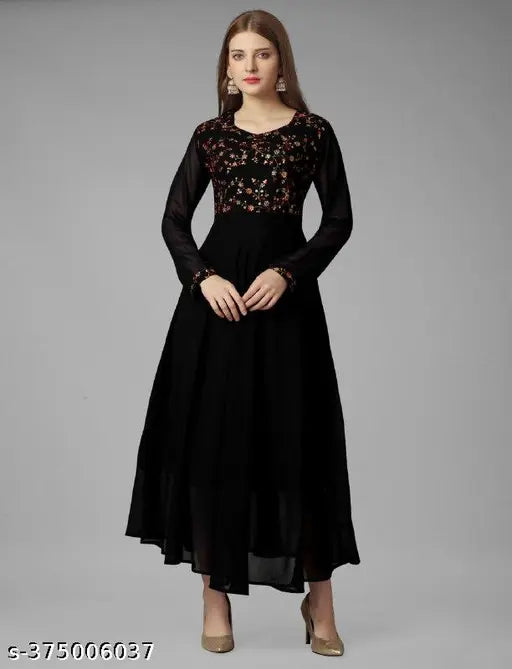 Long, dark blue dress with lace sleeves and embellishments, suitable for formal events