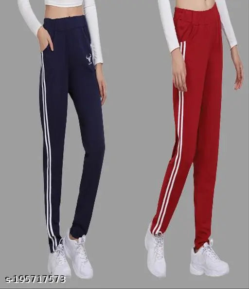 Women's casual navy joggers with white stripe detailing, paired with maroon sports leggings