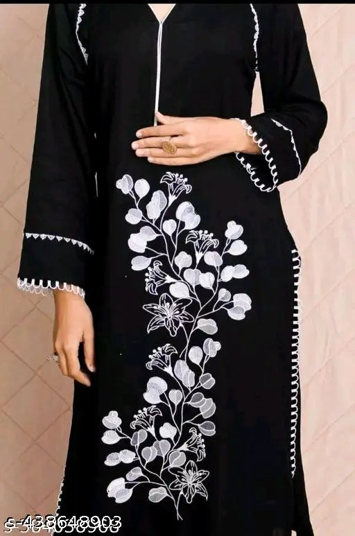 Black rayon embroidered kurti and pants with long sleeves, printed pattern. Set includes sizes S-6XL. Indian handcrafted traditional attire