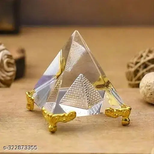 Clear crystal pyramid with golden stand for positive energy, meditation & home temple decor