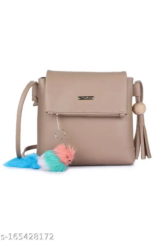 Pale blue Guka girls leather sling bag with multiple card slots and attached tassel
