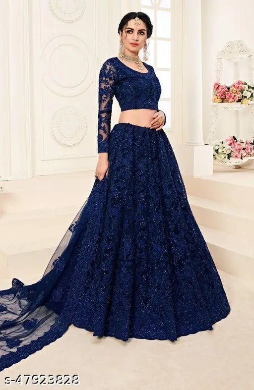 Embroidered green lehenga choli set with net fabric, heavy chain work, and diamond embroidery. Sizes: Semi-stitched (Lehenga waist 40", length 40"). Indo-western wear on display stand