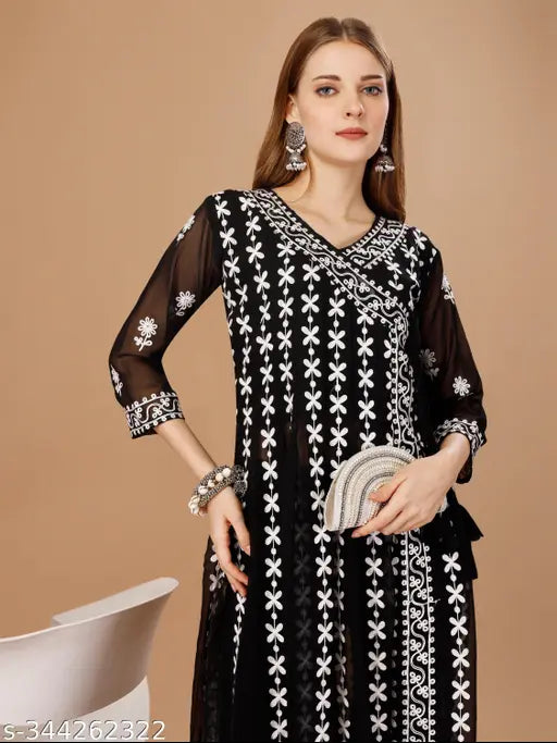 Black embroidered designer kameez dress with flared sleeves and embellished detailing