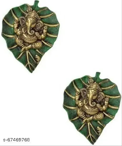 Metal Ganesh wall hanging statue set of 2, gold plated with antique finish for home, temple, office, and gifting purpose. Traditional Indian god idol with a golden finish and leaf design