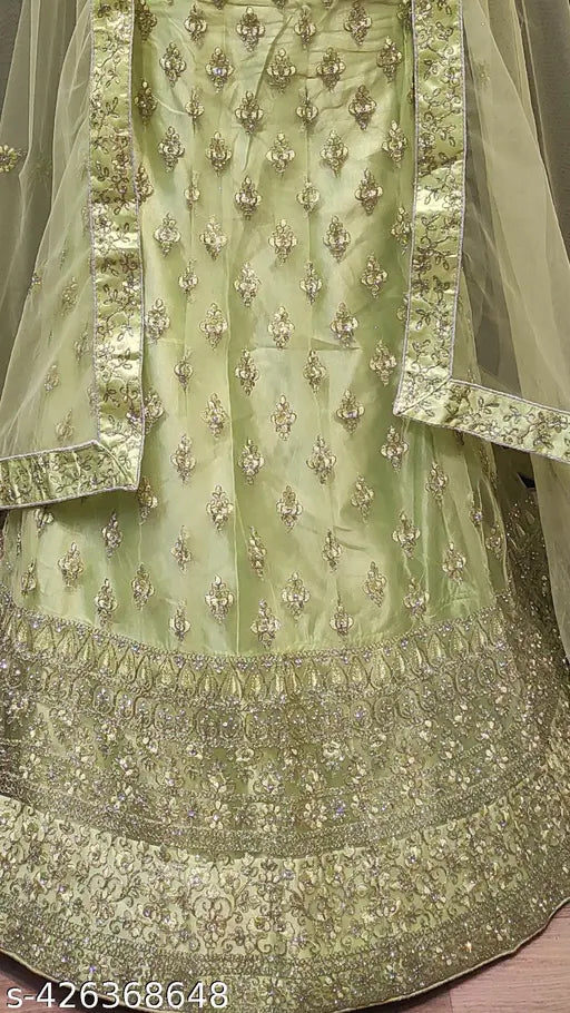 White embroidered net Lehenga choli set with dupatta, free size (43in waist, 42in length), made by Gopinath Enterprise in India