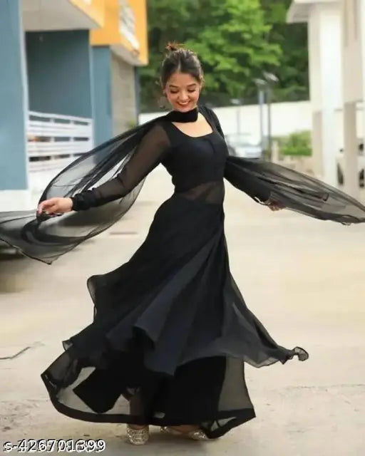 A black georgette long dress with a sheer overlay, elegant and flowing, perfect for evening events