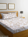 Soft touch, skin-friendly microfiber bedsheet for double bed (90x100 inches, multicolor). Includes 2 king size pillow covers. Breathable and wrinkle-free botanical print. Ideal for summer or mild winter. Machine washable. Made in India