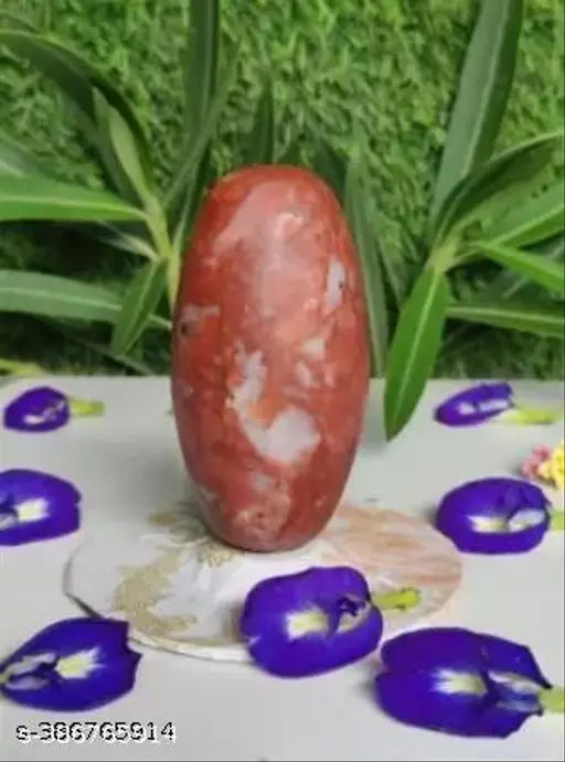 Original Shivling stone with yoni base, black surface, in temple-like setting