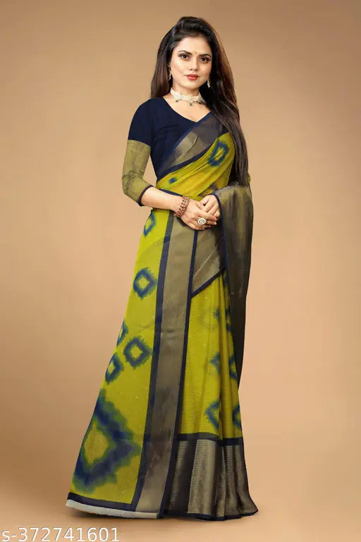 Trendy chiffon saree with big zari border, perfect for parties or traditional wear. Unstitched blouse included. Indian-made fashion for young women." (124 characters)