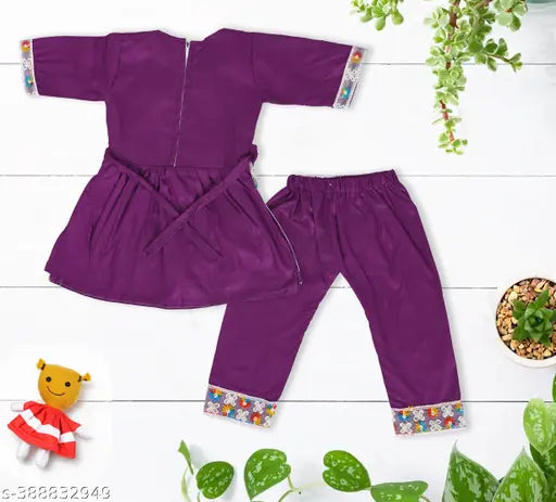 Purple rayon naira kurti set for girls, versatile party wear and casual wear option. Available in various sizes from 9 months to 2-3 years. Made in India