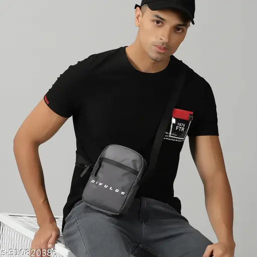 Black sling bag with multiple pockets and compartments, suitable for running or carrying essentials on the go