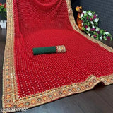 Red traditional sari with patterned border, silk fabric, new edition