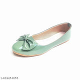 Light green synthetic slip-on ballerinas, shiny Belleis tie on display stand