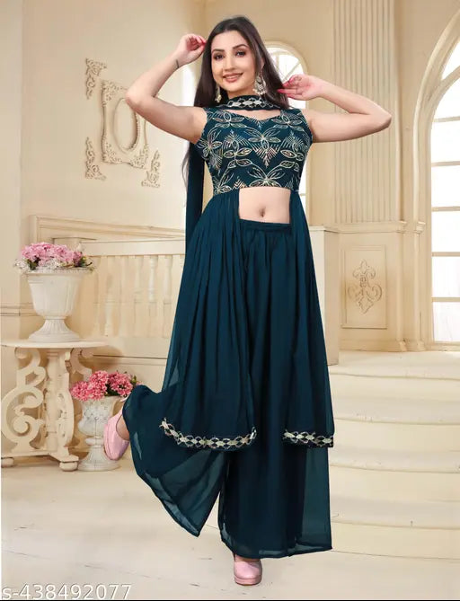 A stylish Indian western ethnic kurti and palazzo set in navy blue, with intricate sequined embroidery, designed for all occasions
