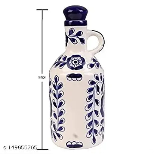 A ceramic oil dispenser for kitchen storage, ideal for oil and vinegar