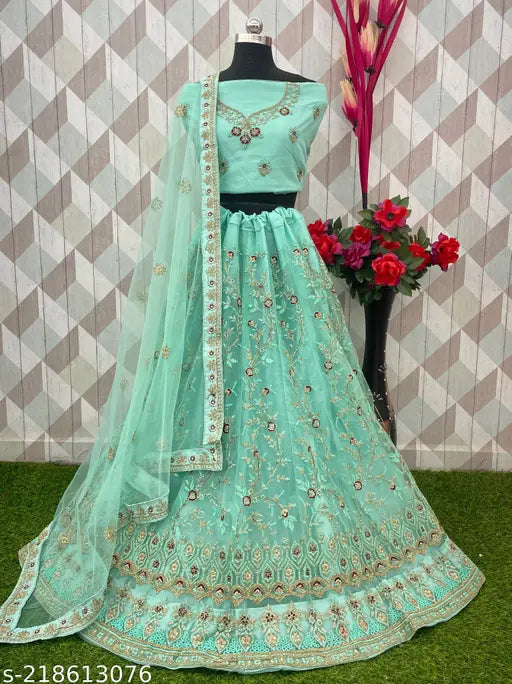 Designer embroidered net Pista Lehenga Choli with matching dupatta, free size (43 in waist, 45 in length), embellished with lace border and cancan flair