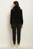 Black velvet truck suit by M.A Fashion, featuring long sleeves and a stylish design for women's bottom wear