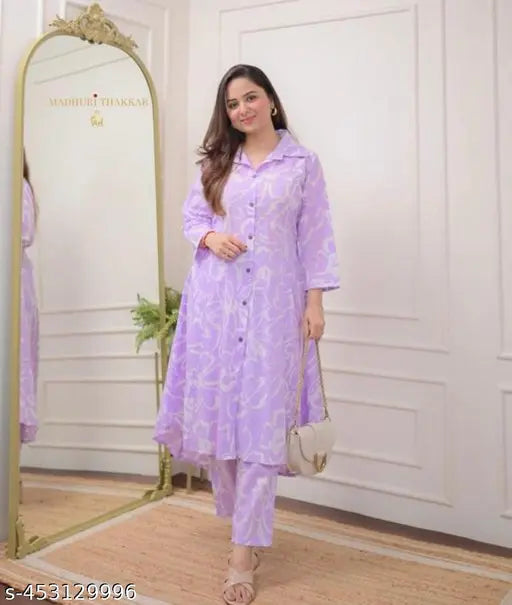 Trendy floral print women's cotton kurta with palazzos, Solid net design, three-quarter sleeves