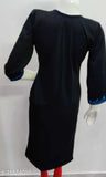 Black wool kurti with a pattern of lines and shapes on it