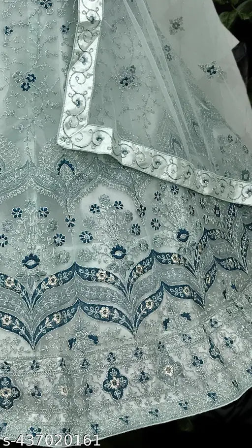 Embroidered net lehenga-choli set with dupatta, free size, best for regular occasions. Indian designer wedding wear