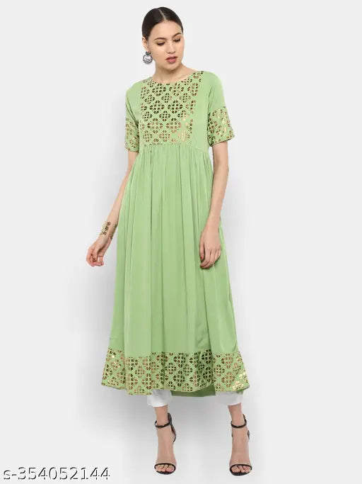 Light green poly crepe flared kurta, three-quarter sleeves, gold print pattern. Women's Indian fashion wear on mannequin