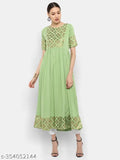 Light green poly crepe flared kurta with gold print, three-quarter sleeves on Indian woman